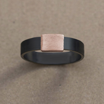 5mm Rose Gold Barrel Band Wedding Ring on kraft paper