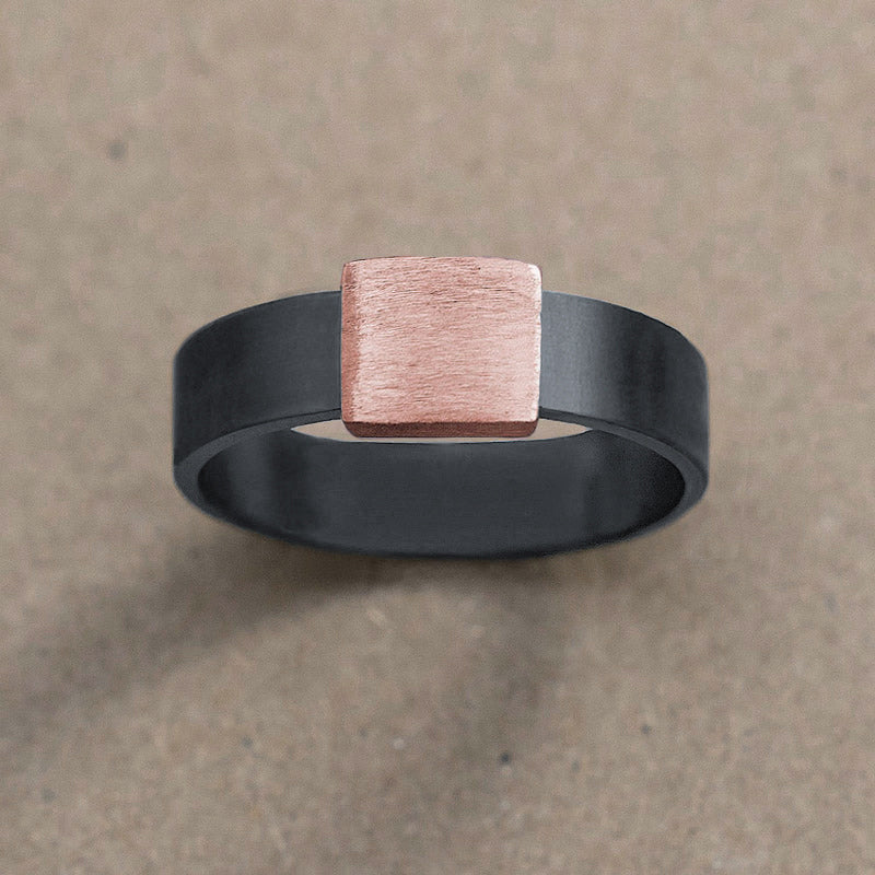 7mm Rose Gold Barrel Band Wedding Ring on kraft paper