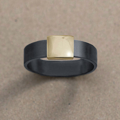 7mm Yellow Gold Barrel Band Wedding Ring on kraft paper