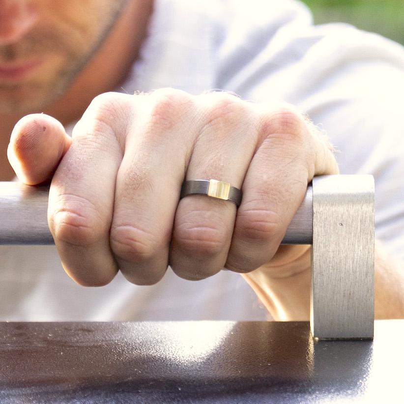 The Gunmetal 7mm Barrel Band with a yellow gold insert holding the grille.